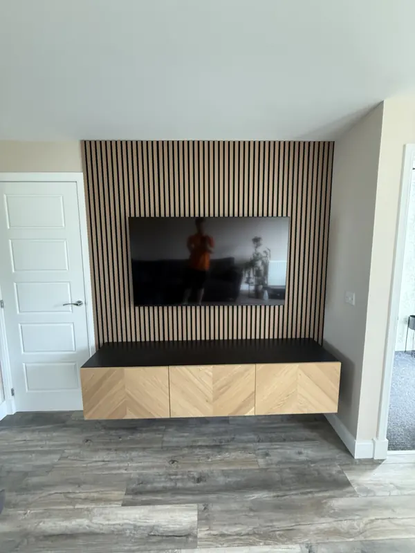 Slatted TV wall with floating cabinet